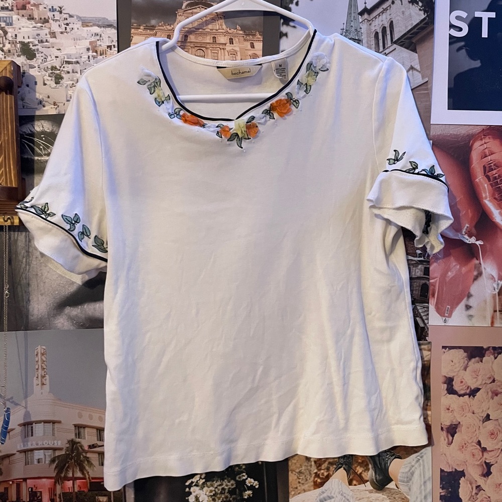 white shirt with flower design